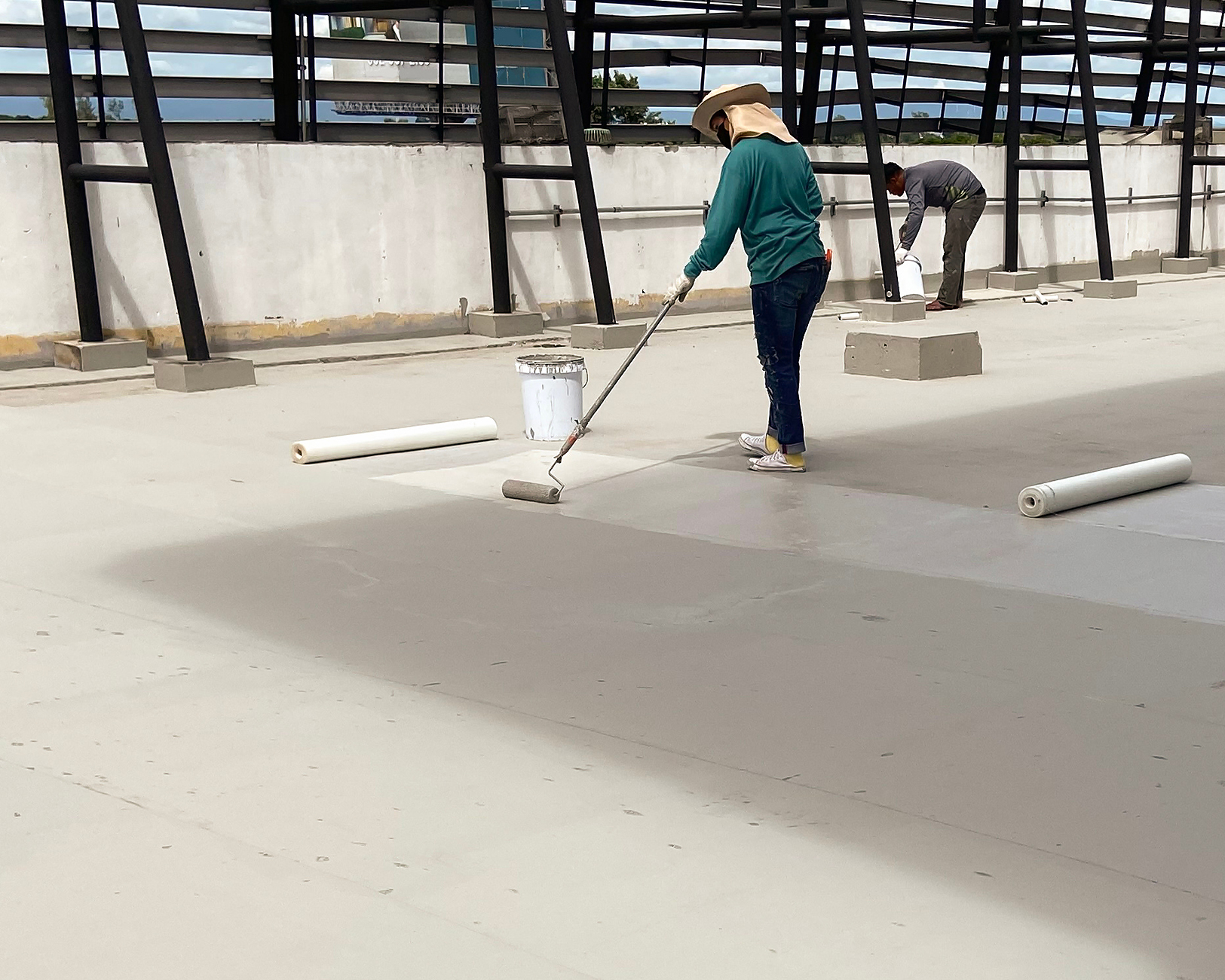Reflective white coating finished on Phoenix commercial low slope roof