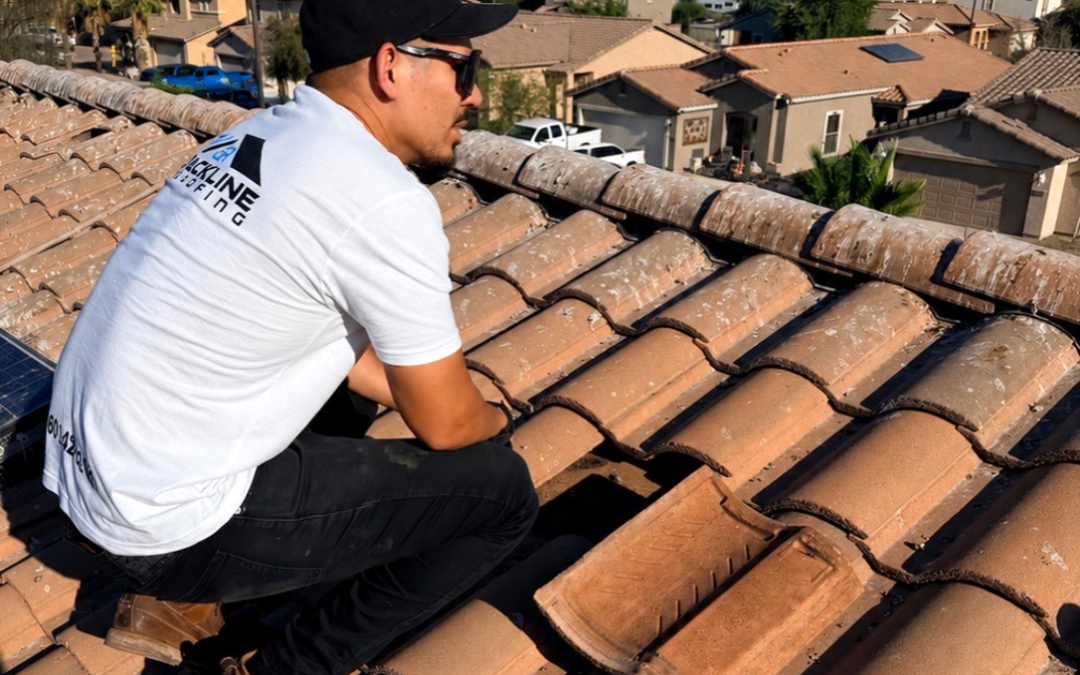Cracked and brittle old underlayment removed from Chandler tile roof